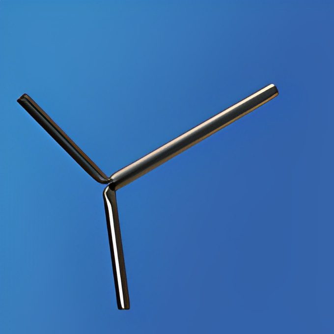 Metallic boomerang against a blue background.